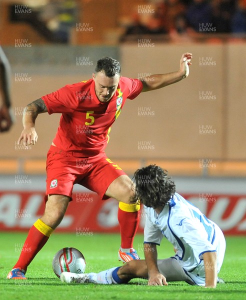 150812 - Wales v Bosnia Herzegovina, Vauxhall International Friendly -   Darcy Blake of Wales, left, compete's for the ball with Adnan Zahirovic  of Bosnia Herzegovina   
