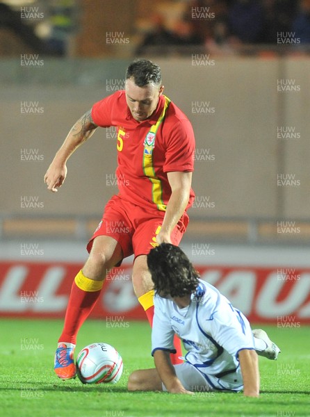 150812 - Wales v Bosnia Herzegovina, Vauxhall International Friendly -   Darcy Blake of Wales, left, compete's for the ball with Adnan Zahirovic  of Bosnia Herzegovina   