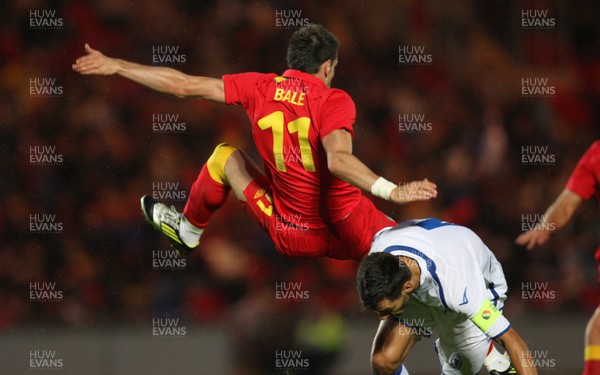 150812 - Wales v Bosnia Herzegovina, Vauxhall International Friendly - Wales' Gareth Bale is brought down by Bosnia Herzegovina's Emir Spahic 