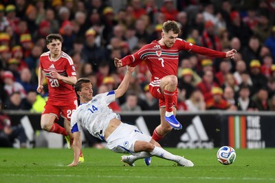 260326 - Wales v Bosnia-Herzegovina - 2026 FIFA World Cup Qualifying - Play-off Semi-final - David Brooks of Wales is challenged by Ivan Sunjic of Bosnia