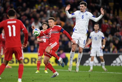 260326 - Wales v Bosnia-Herzegovina - 2026 FIFA World Cup Qualifying - Play-off Semi-final - Ethan Ampadu of Wales as a shot on goal blocked