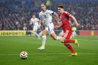 260326 - Wales v Bosnia-Herzegovina - 2026 FIFA World Cup Qualifying - Play-off Semi-final - Daniel James of Wales is challenged by Dario Saric of Bosnia