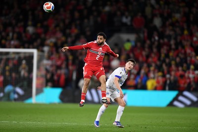 260326 - Wales v Bosnia-Herzegovina - 2026 FIFA World Cup Qualifying - Play-off Semi-final - Jay Dasilva of Wales wins the header 