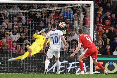 260326 - Wales v Bosnia-Herzegovina - 2026 FIFA World Cup Qualifying - Play-off Semi-final - Karl Darlow of Wales saves the ball onto the post to keep Wales ahead