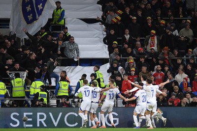 260326 - Wales v Bosnia-Herzegovina - 2026 FIFA World Cup Qualifying - Play-off Semi-final - Edin Dzeko of Bosnia celebrates scoring a goal with team mates]