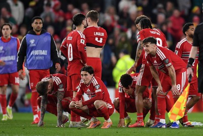 260326 - Wales v Bosnia-Herzegovina - 2026 FIFA World Cup Qualifying - Play-off Semi-final - Dejected Wales after losing the shootout