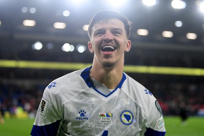 260326 - Wales v Bosnia-Herzegovina - 2026 FIFA World Cup Qualifying - Play-off Semi-final - Tarik Muharemovic of Bosnia celebrates at full time