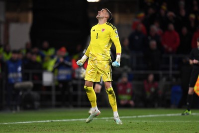 260326 - Wales v Bosnia-Herzegovina - 2026 FIFA World Cup Qualifying - Play-off Semi-final - Karl Darlow of Wales saves a penalty 