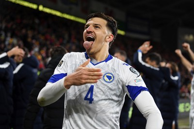 260326 - Wales v Bosnia-Herzegovina - 2026 FIFA World Cup Qualifying - Play-off Semi-final - Tarik Muharemovic of Bosnia celebrates at full time