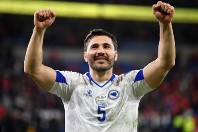 260326 - Wales v Bosnia-Herzegovina - 2026 FIFA World Cup Qualifying - Play-off Semi-final - Denis Huseinbasic of Bosnia celebrates at full time