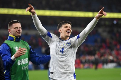 260326 - Wales v Bosnia-Herzegovina - 2026 FIFA World Cup Qualifying - Play-off Semi-final - Tarik Muharemovic of Bosnia celebrates at full time