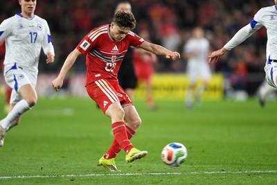 260326 - Wales v Bosnia-Herzegovina - 2026 FIFA World Cup Qualifying - Play-off Semi-final - Daniel James of Wales has a shot on goal