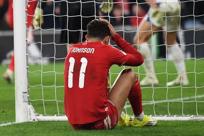 260326 - Wales v Bosnia-Herzegovina - 2026 FIFA World Cup Qualifying - Play-off Semi-final - Dejected Brennan Johnson of Wales
