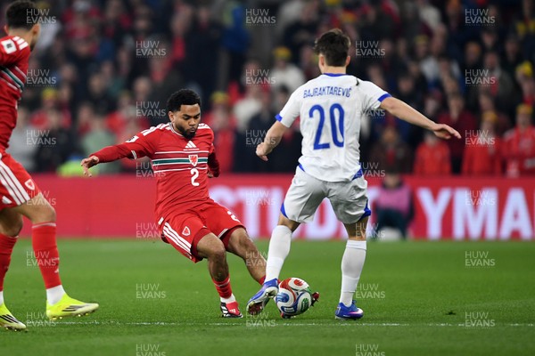 260326 - Wales v Bosnia-Herzegovina - 2026 FIFA World Cup Qualifying - Play-off Semi-final - Jay Dasilva of Wales is challenged by Esmir Bajraktarevic of Bosnia