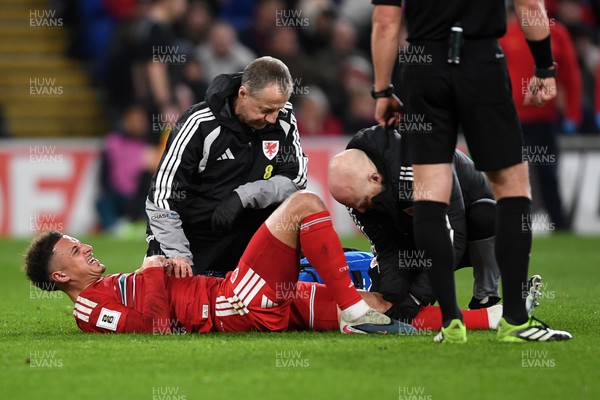 260326 - Wales v Bosnia-Herzegovina - 2026 FIFA World Cup Qualifying - Play-off Semi-final - Ethan Ampadu of Wales receives treatment