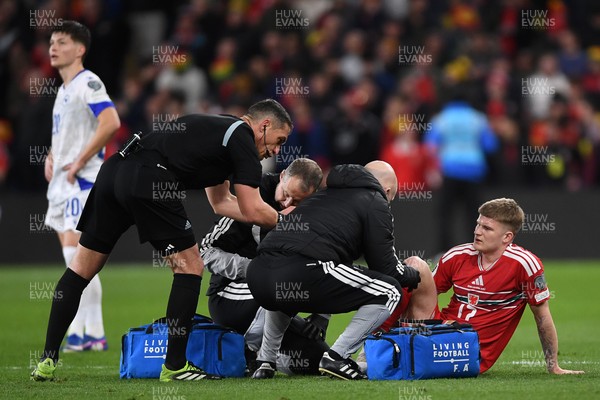 260326 - Wales v Bosnia-Herzegovina - 2026 FIFA World Cup Qualifying - Play-off Semi-final - Jordan James of Wales receives treatment