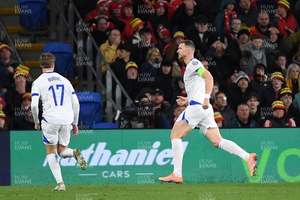260326 - Wales v Bosnia-Herzegovina - 2026 FIFA World Cup Qualifying - Play-off Semi-final - Edin Dzeko of Bosnia celebrates scoring a goal with team mates]