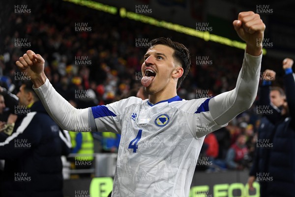 260326 - Wales v Bosnia-Herzegovina - 2026 FIFA World Cup Qualifying - Play-off Semi-final - Tarik Muharemovic of Bosnia celebrates at full time
