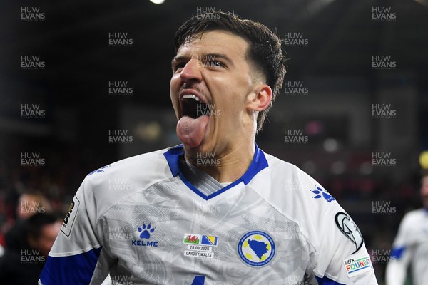 260326 - Wales v Bosnia-Herzegovina - 2026 FIFA World Cup Qualifying - Play-off Semi-final - Tarik Muharemovic of Bosnia celebrates at full time