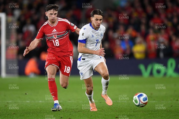 260326 - Wales v Bosnia-Herzegovina - 2026 FIFA World Cup Qualifying - Play-off Semi-final - Mark Harris of Wales is challenged by Amar Dedic of Bosnia