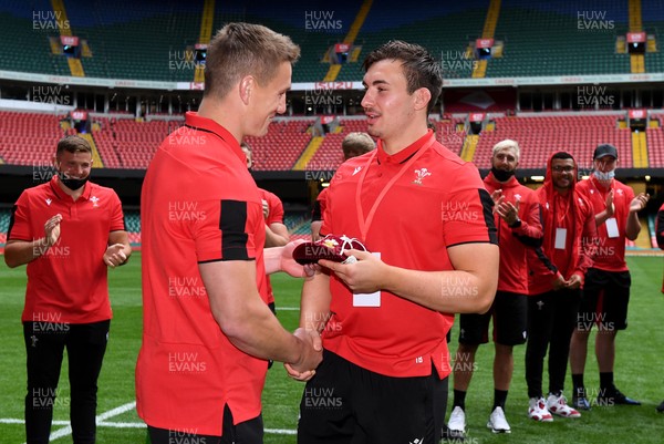 030721 - Wales v Canada - Summer International Rugby - Taine Basham of Wales receives his first cap from Jonathan Davies