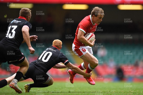 030721 - Wales v Canada - Summer International Rugby - Nick Tompkins of Wales is tackled by Peter Nelson of Canada