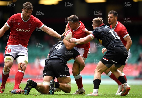 030721 - Wales v Canada - Summer International Rugby - Elliot Dee of Wales is tackled by Conor Keys of Canada