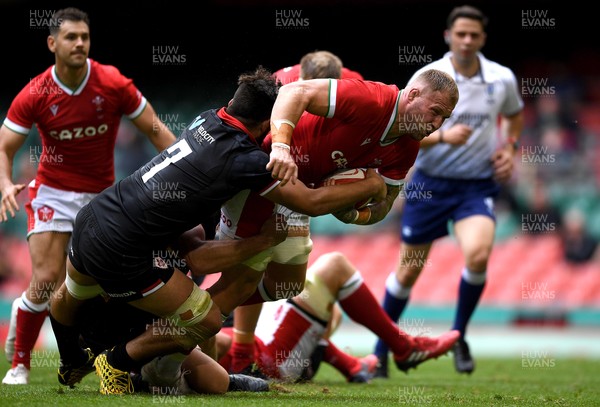 030721 - Wales v Canada - Summer International Rugby - Ross Moriarty of Wales is tackled by Lucas Rumball of Canada