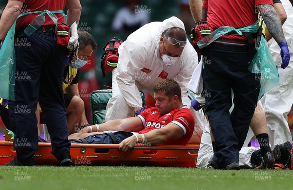 030721 - Wales v Canada - Summer Internationals - Leigh Halfpenny of Wales leaves the field injured