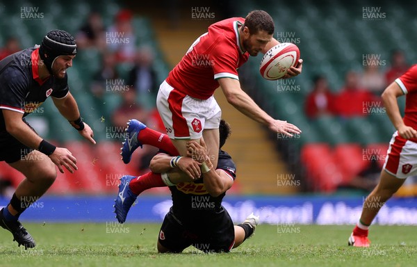 030721 - Wales v Canada - Summer Internationals - Jonah Holmes of Wales is tackled by Ross Braude of Canada