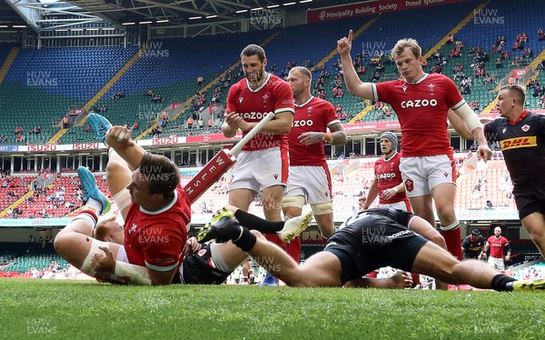 030721 - Wales v Canada - Summer Internationals - Taine Basham of Wales celebrates scoring a try with team mates Jonah Holmes, Ross Moriarty and Nick Tompkins of Wales