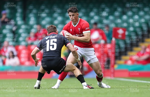 030721 - Wales v Canada, Summer International Series - Tom Rogers of Wales takes on Cooper Coats of Canada