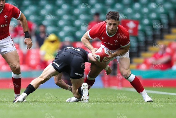 030721 - Wales v Canada, Summer International Series - Tom Rogers of Wales takes on Cooper Coats of Canada