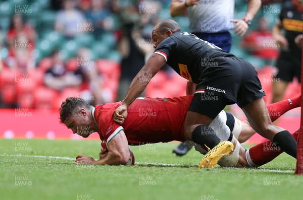 030721 - Wales v Canada, Summer International Series - Will Rowlands of Wales beats Kaiona Lloyd of Canada to score try