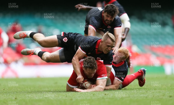 030721 - Wales v Canada, Summer International Series - Will Rowlands of Wales is tackled by Ben Lesage of Canada 