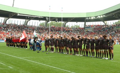 09.09.07 - Wales v Canada - Rugby World Cup 2007 - France - Players line up for a minutes silence in honor of SIR TASKER WATKINS, who passed away in the early hours of this morning 