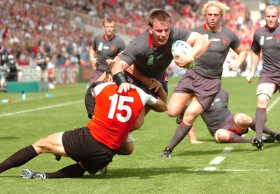 09.09.07 - Wales v Canada - Rugby World Cup 2007 - France - Wales' Matthew Rees is tackled by Canada's Mike Pyke 