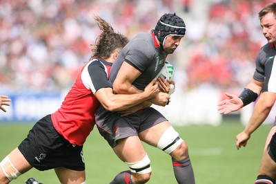 09.09.07 Wales v Canada RWC2007 Wales Jonathan Thomas is tackled by Sean-Michael Stephen. 
