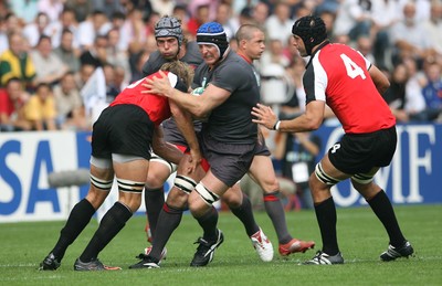 09.09.07 Wales v Canada RWC2007 Wales Jonathan Thomas is tackled by Mike James 