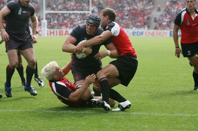 09.09.07 Wales v Canada RWC2007... Wales Alun-Wyn Jones scores try despite tackle by James pritchard and Dave Spicer. 