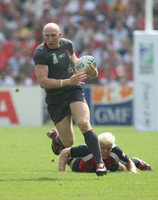 09.09.07 Wales v Canada RWC2007... Wales Tom Shanklin beats Dave Spicer. 