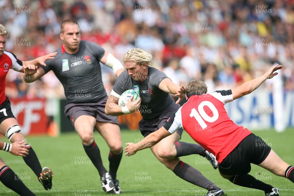 09.09.07 Wales v Canada RWC2007 Wales Alix Popham is tackled by Ander Monro 