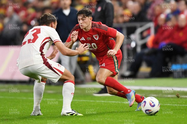 090925 - Wales v Canada -  International Friendly - Daniel James of Wales is challenged by Niko Sigur of Canada