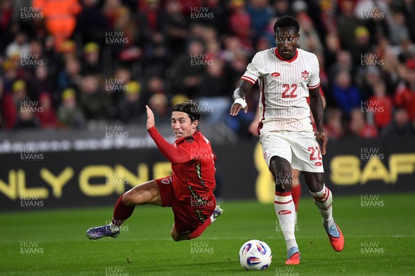 090925 - Wales v Canada -  International Friendly - Harry Wilson of Wales is challenged by Richie Laryea of Canada