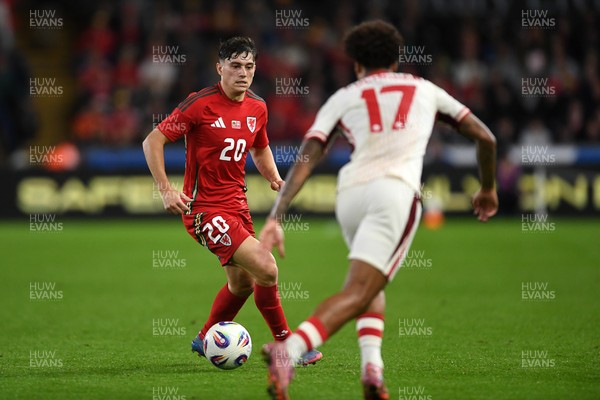 090925 - Wales v Canada -  International Friendly - Daniel James of Wales is challenged by Tajon Buchanan of Canada