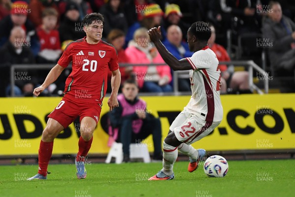 090925 - Wales v Canada -  International Friendly - Daniel James of Wales is challenged by Richie Laryea of Canada