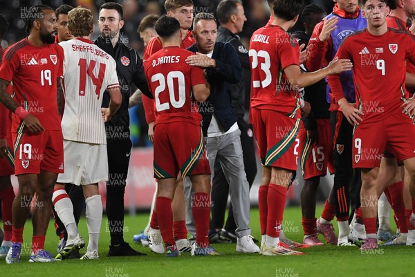 090925 - Wales v Canada -  International Friendly - Craig Bellamy, Wales Manager and Daniel James of Wales at full time