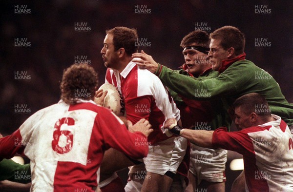 101193 - Wales v Canada - Ian Cooper of Canada is caught by Tony Copsey and Gareth Llewellyn of Wales