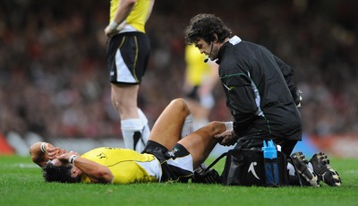 14.11.08 - Wales v Canada -  Invesco Perpetual Series 2008 - Wales' James Hook is treated for an injury.  