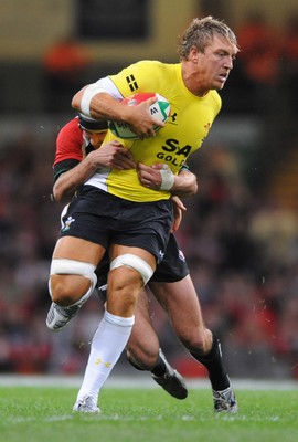 14.11.08 - Wales v Canada -  Invesco Perpetual Series 2008 - Wales' Andy Powell is tackled by Canada's Ryan Smith.  